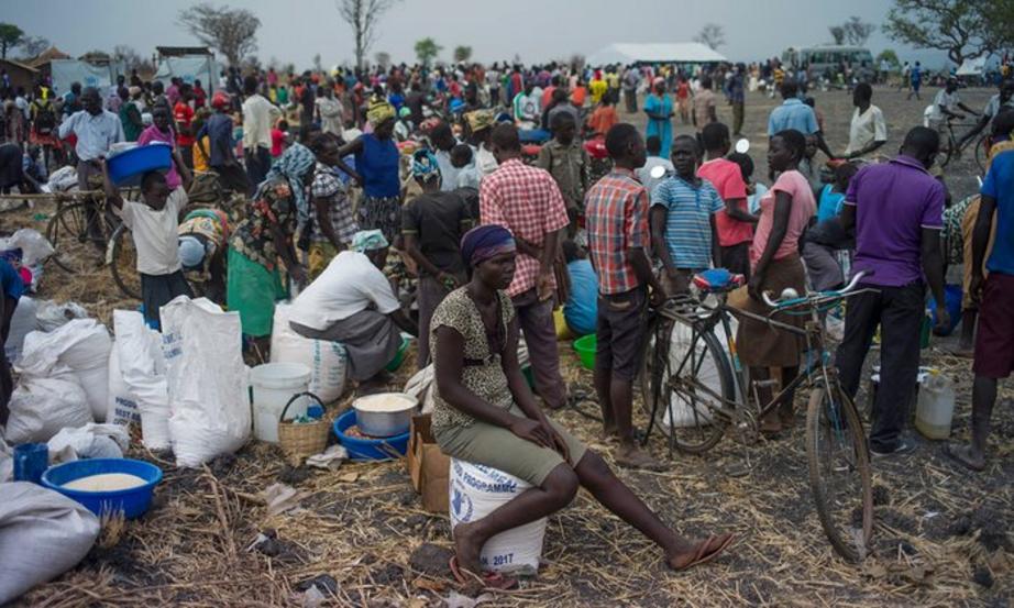 Refugees gather at a settlement in Palorinya, northern Uganda. In March, 2,800 people arrived in Uganda every day from South Sudan. 