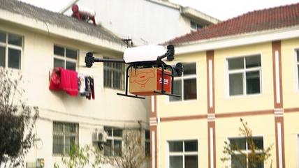 In this image taken from a Nov. 9, 2016 video footage by AP Video, a drone takes off to deliver JD.com parcel from Tiantong'an village near Suqian city in eastern China's Jiangsu province. China's biggest online retailer, JD.com Inc., announced plans Mond