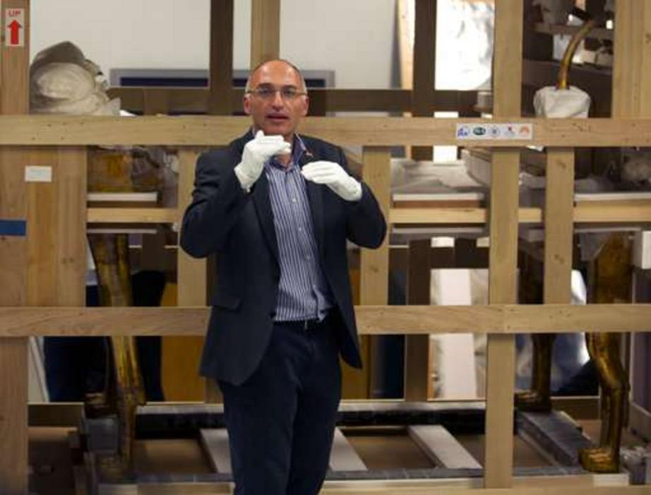 Tarek Tawfik, director of the Grand Egyptian Museum, speaks to reporters in front of king Tutankhamun's funerary bed upon its arrival at the Grand Egyptian Museum in Cairo, Egypt, Tuesday, May 23, 2017. The museum received the funerary bed and a chariot a