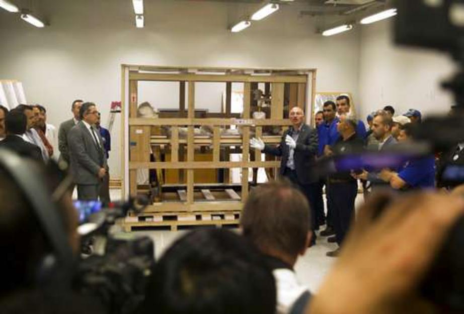 Tarek Tawfik, director of the Grand Egyptian Museum, speaks to reporters in front of king Tutankhamun's funerary bed upon its arrival at the Grand Egyptian Museum in Cairo, Egypt, Tuesday, May 23, 2017. The museum received the funerary bed and a chariot a