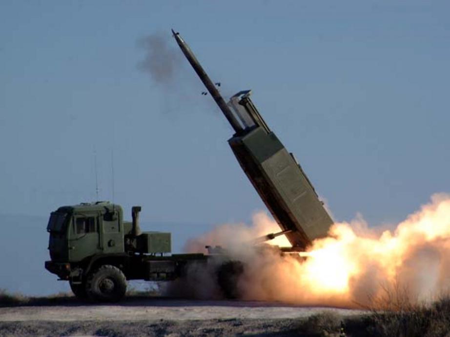 The High Mobility Artillery Rocket System fires the Army's new guided Multiple Launch Rocket System during testing at White Sands Missile Range, N.M. U.S. Army photo  