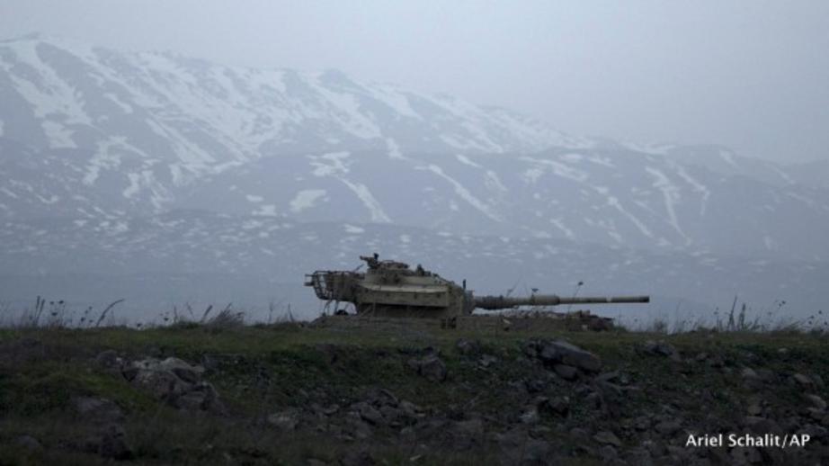 An old Israeli tank sits in a position in the Israeli-occupied Golan Heights near the border with Syria, Jan. 27, 2015.