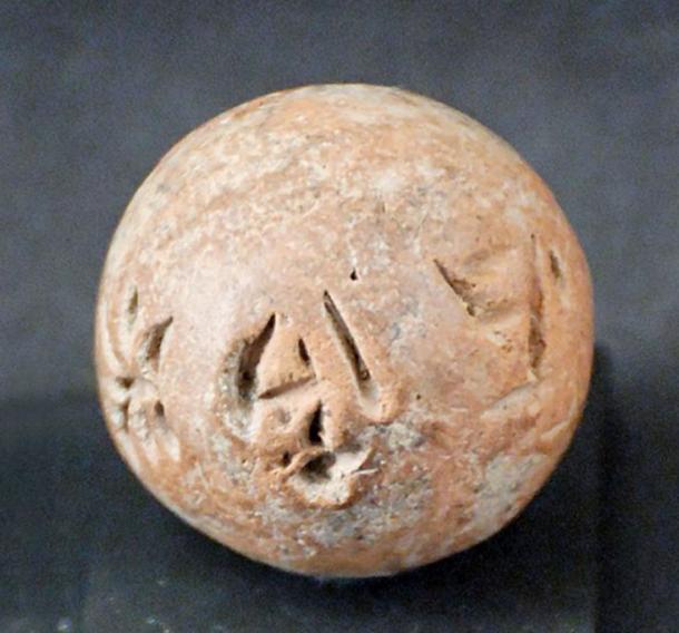 Ball with Cypro-Minoan 1 inscription. 