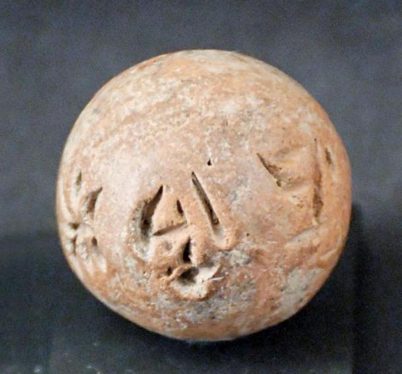 Ball with Cypro-Minoan 1 inscription. 