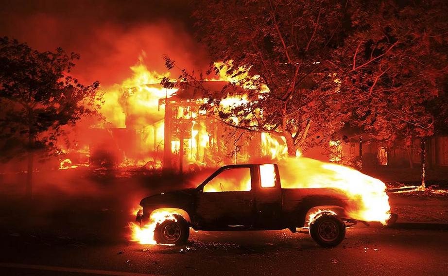 . Coffey Park homes burn in Santa Rosa. Kent Porter / The Press Democrat via AP