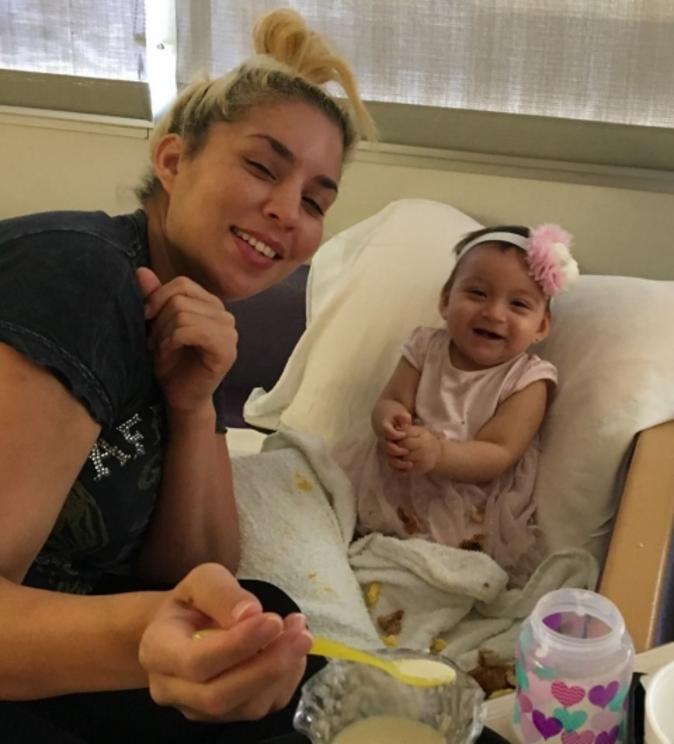 Aniya smiling with her mother shortly before she was taken from her mother. 