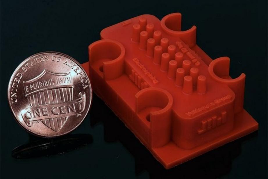 A 3-D-printed manufacturing device can extrude fibers that are only 75 nanometers in diameter, or one-thousandth the width of a human hair.  Credit: Luis Fernando Velásquez-García