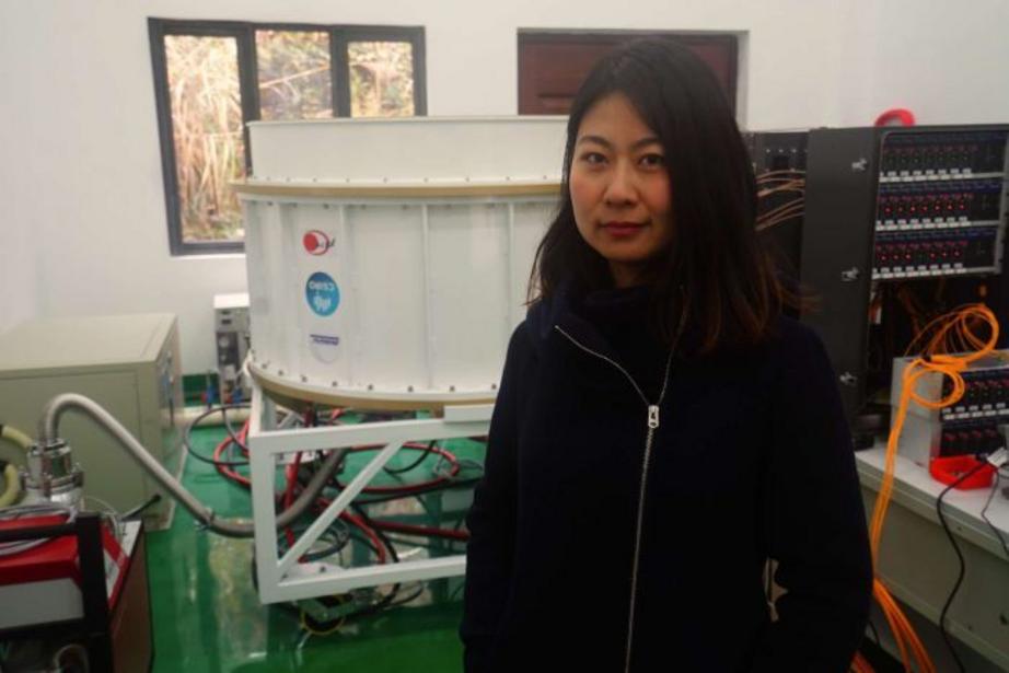 Electronics engineer Fan Jin with the CSIRO-made receiver as it undergoes final tests.