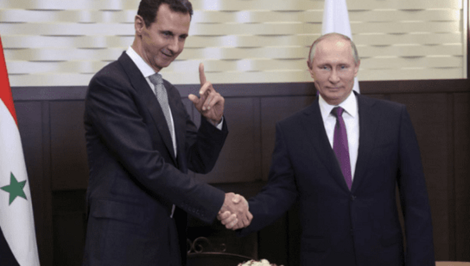 Syrian leader Bashar al Assad (left) meets Russian President Vladimir Putin (right). | Photo: Reuters