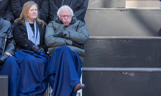  Jane and Bernie Sanders feel the cold at the inauguration of New York City’s mayor, Bill de Blasio, in frigid weather in front of City Hall. Photograph: Pacific Press / Barcroft Images 