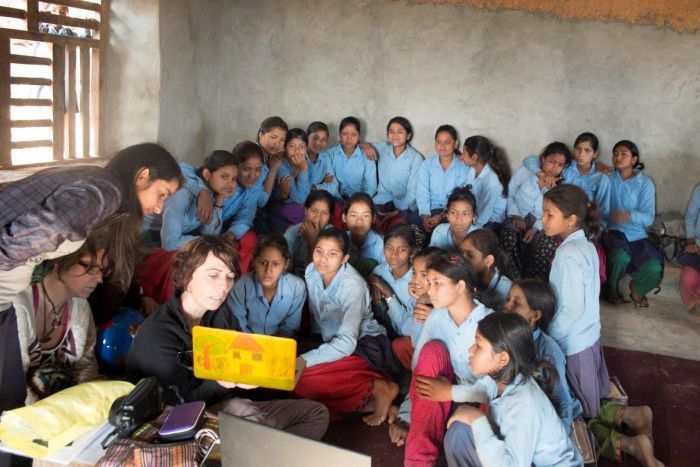 Be Artsy CEO Clara Garcia i Ortes educates Nepalese girls on the benefits of the menstrual cup.