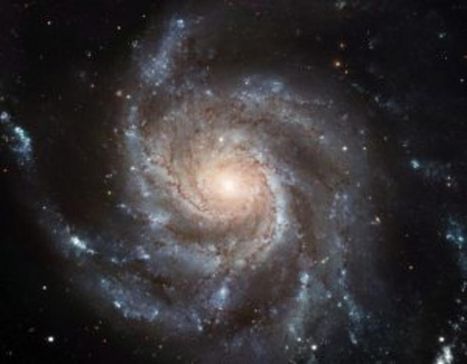 This Hubble image reveals the gigantic Pinwheel galaxy, one of the best known examples of “grand design spirals”, and its supergiant star-forming regions in unprecedented detail. The image is the largest and most detailed photo of a spiral galaxy ever rel