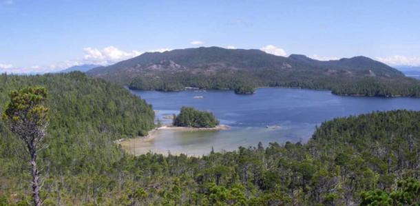 View across the beach with Calvert Island in the foreground and Hecate Island in the background.