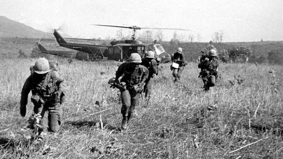 American soldiers get off helicopters during the operation 